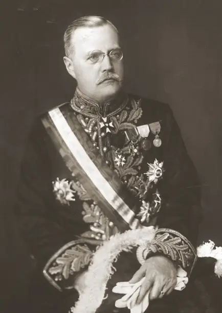 Portrait of a man in a dress uniform with embroidered collar and decorations