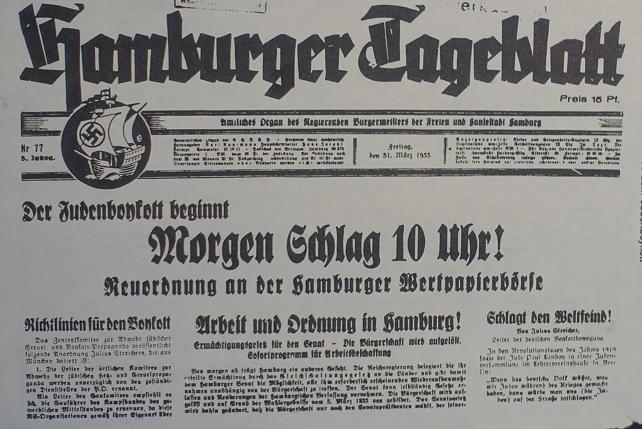 The upper half of a newspaper front page with the Gothic masthead 'Hamburger Tageblatt' and a ship emblem, and the headline 'Der Judenboykott beginnt – Morgen Schlag 10 Uhr!' across several columns.